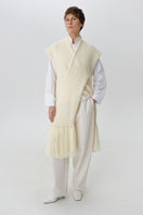 Textured knit vest from DELEGAN, styled as a cardigan, shown worn on the front with a cozy, chunky knit pattern.