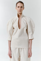 Gray-beige structure shirt by DELEGAN, front view showing tailored fit and collar, made from comfortable fabric.
