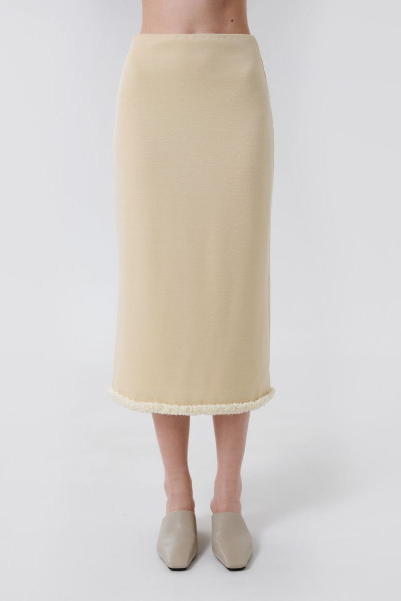 Delegan wool midi skirt displayed from the front, showcasing its classic design and tailored fit.