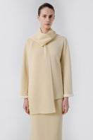 Delegan wool sweater showing a cozy, fitted front view in soft knit fabric with subtle color details.