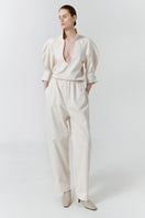 Gray-beige structure pants by Delegan, front view showing tailored fit and sleek design.