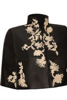 Nadya Shah Cape Victoire jacket displayed on a model, featuring stylish design and high-quality fabric for a chic winter look.