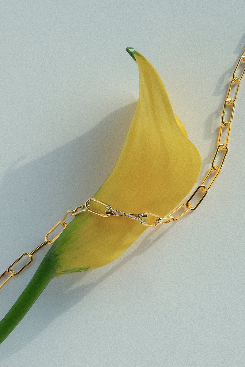 Gold plated silver Xavi bracelet with diamond accents, featuring yellow vermeil finish, by EDXÚ.