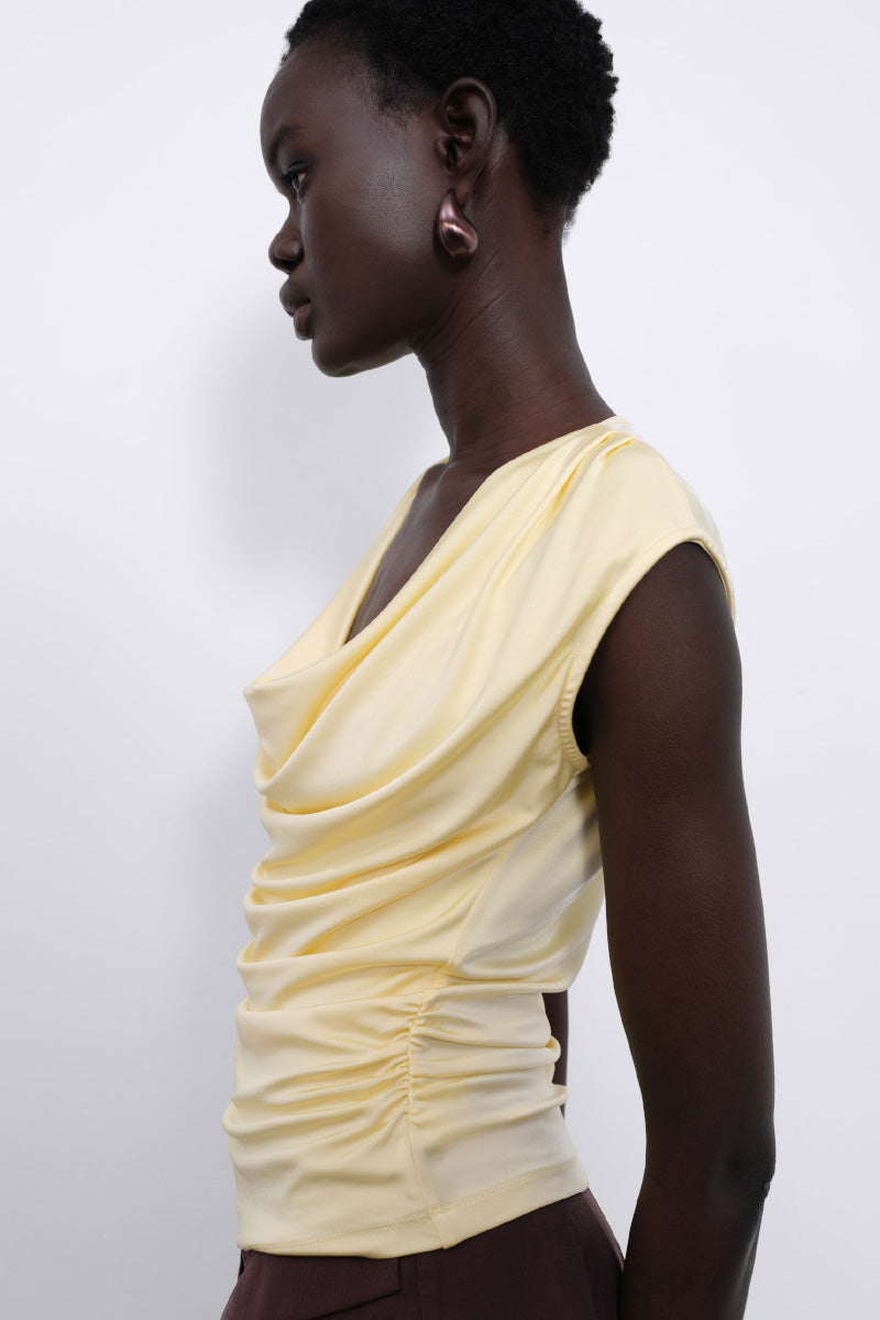 SÉLONE YLUNE Liquid Drape Top in Butter Yellow, lightweight women's top with flowing fabric and elegant drape.