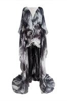 Black Le Thanh Hoa Soaring Doves maxi dress featuring a flowing, elegant silhouette and intricate dove-themed embroidery.