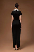Black sweetheart bowtie long gown by HACCHIC COUTURE featuring a fitted bodice and flowing skirt for elegant formal occasions.