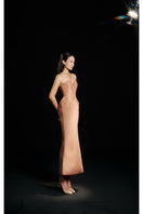 Hacchic Couture Sendra strapless bow dress in nude caramel, elegant gown with a bow detail, smooth fabric, and fitted bodice.