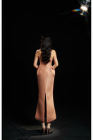 Hacchic Couture Sendra strapless bow dress in nude caramel, elegant gown with a fitted bodice and bow detail at the waist.