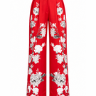 Red Raishma Zena trousers showing a stylish pair of tailored pants with a sleek fit and vibrant color.