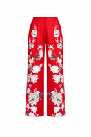 Red Raishma Zena trousers showing a stylish pair of tailored pants with a sleek fit and vibrant color.