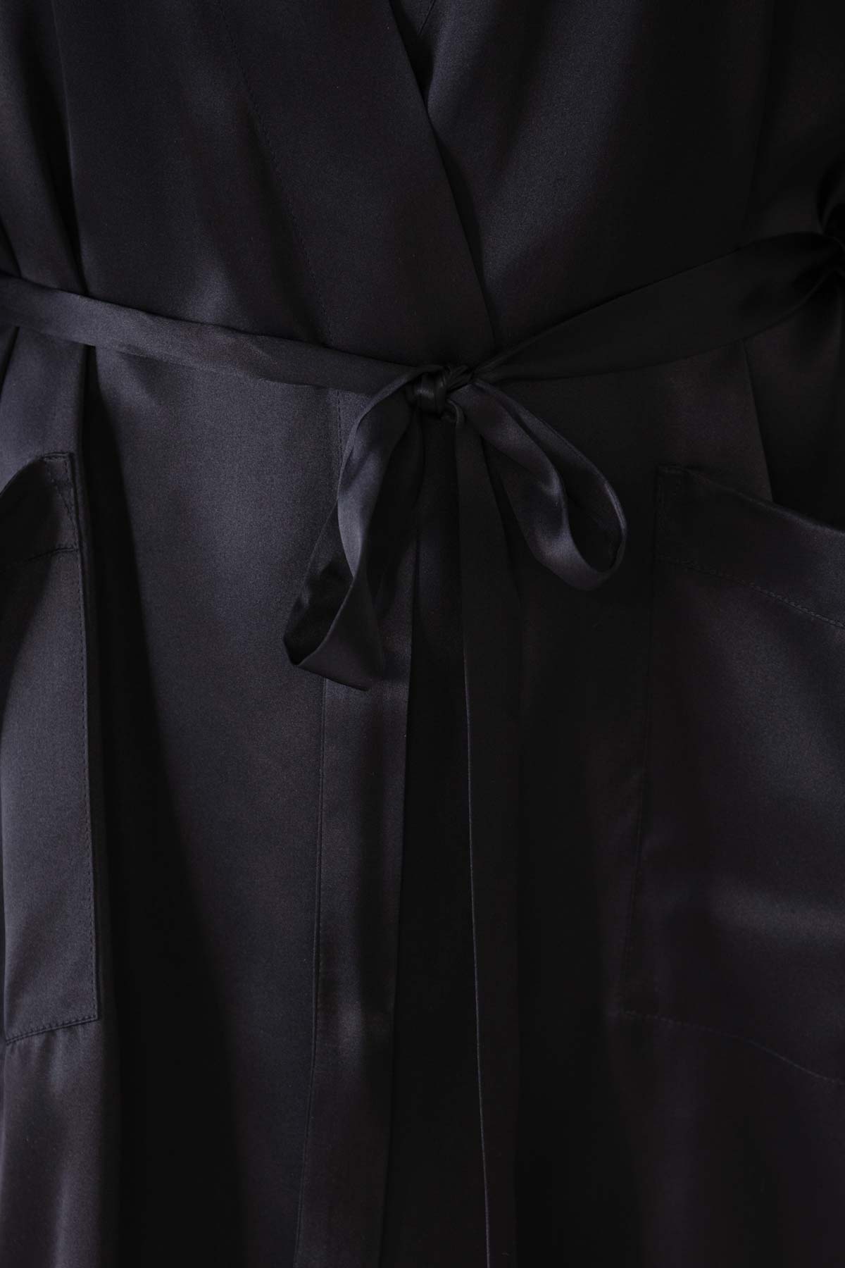 Black NK IMODE Zero Waste Robe displayed with detailed close-up of fabric and sustainable design features.