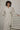 FAUX LEATHER WHITE COAT WITH KNITTED SLEEVES | Liya | CULT MIA