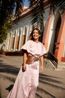 Brown leather belt from Adriana Castro's La Jefa collection, featuring a sleek design and stylish buckle.