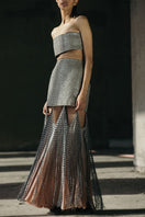 Hand-woven silk blend maxi skirt with chiffon panels in ecru, gray, and peach by AKHL, showcasing elegant fabric and flowing design.