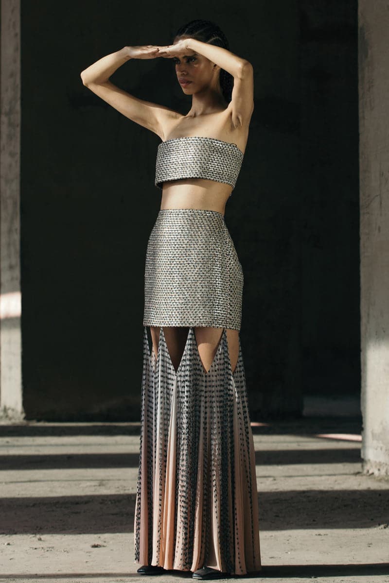 Ecru and gray hand-woven silk blend maxi skirt with flowing chiffon panels by AKHL, styled with a relaxed fit and elegant drape.