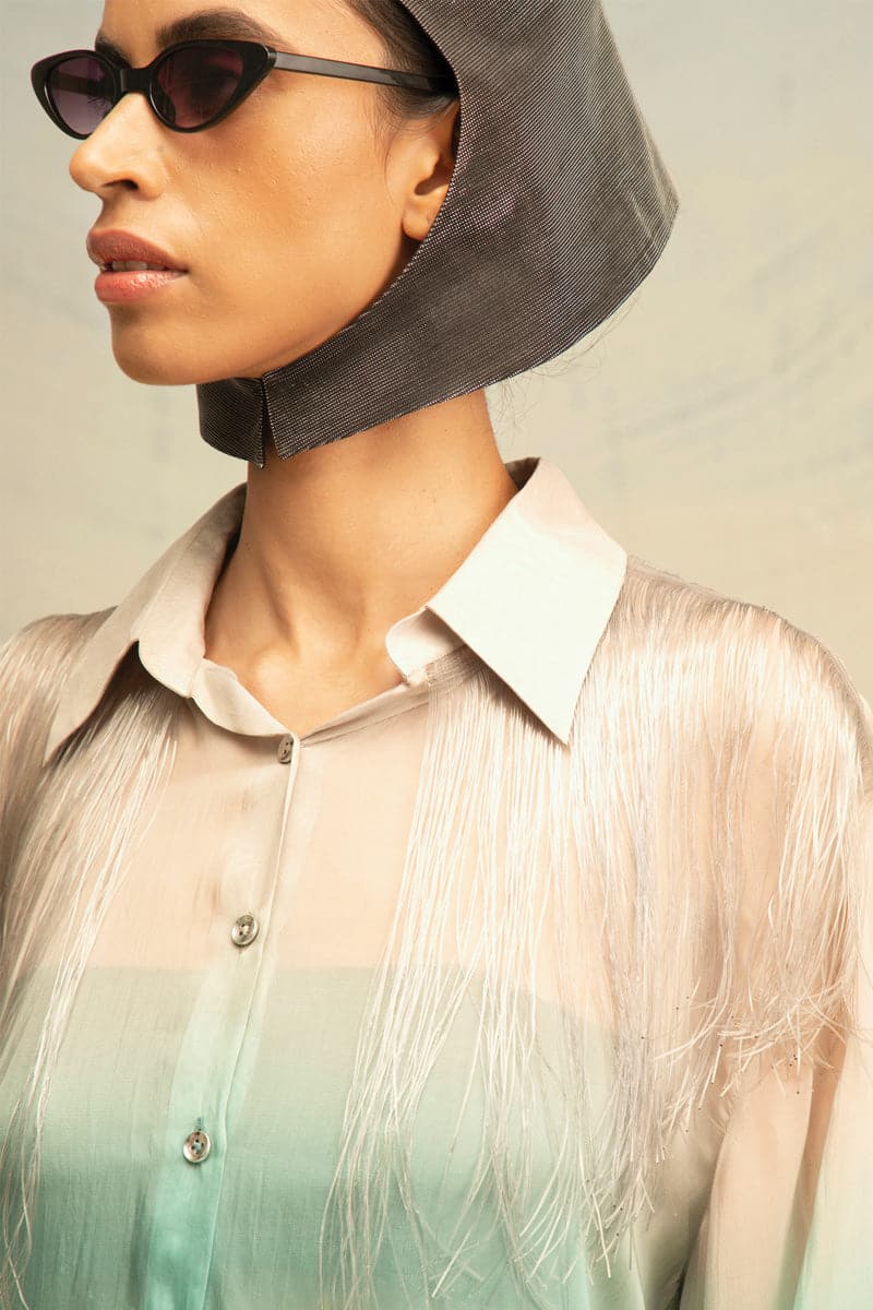 Silk gradient blouse with fringe details in gray and turquoise, by AKHL, featuring a stylish and elegant design for women's tops.