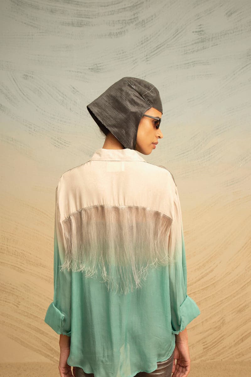 Gray and turquoise silk blouse with fringe detail from AKHL, showcasing a gradient design and stylish top for elegant wear.