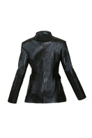 Asymmetric cutout vegan leather blazer by Blikvanger, featuring stylish design and tailored fit, shown in a close-up image.