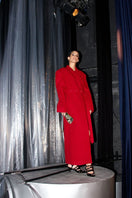 Structured full-length maroon coat by Blikvanger, shown on a model with a tailored fit and classic collar, perfect for stylish winter wear.