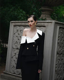 Black Dalood ARIA off-shoulder asymmetric blazer with structured design and long sleeves, stylish for modern fashion.