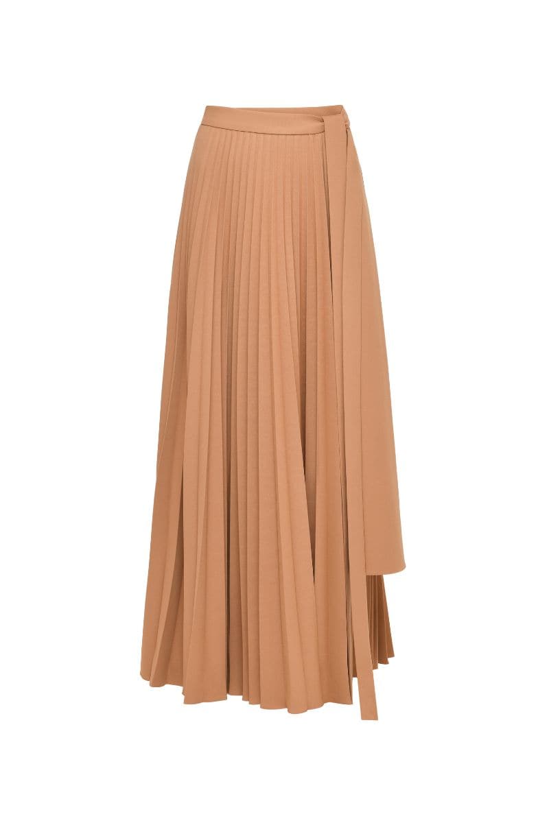Brown Dalood Brianna Maxi Skirt displayed on a model, showcasing its flowy fabric and elegant design.