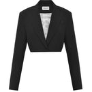 Black Dalood Greta cropped blazer, tailored fit with lapel collar and long sleeves, styled on a neutral background.