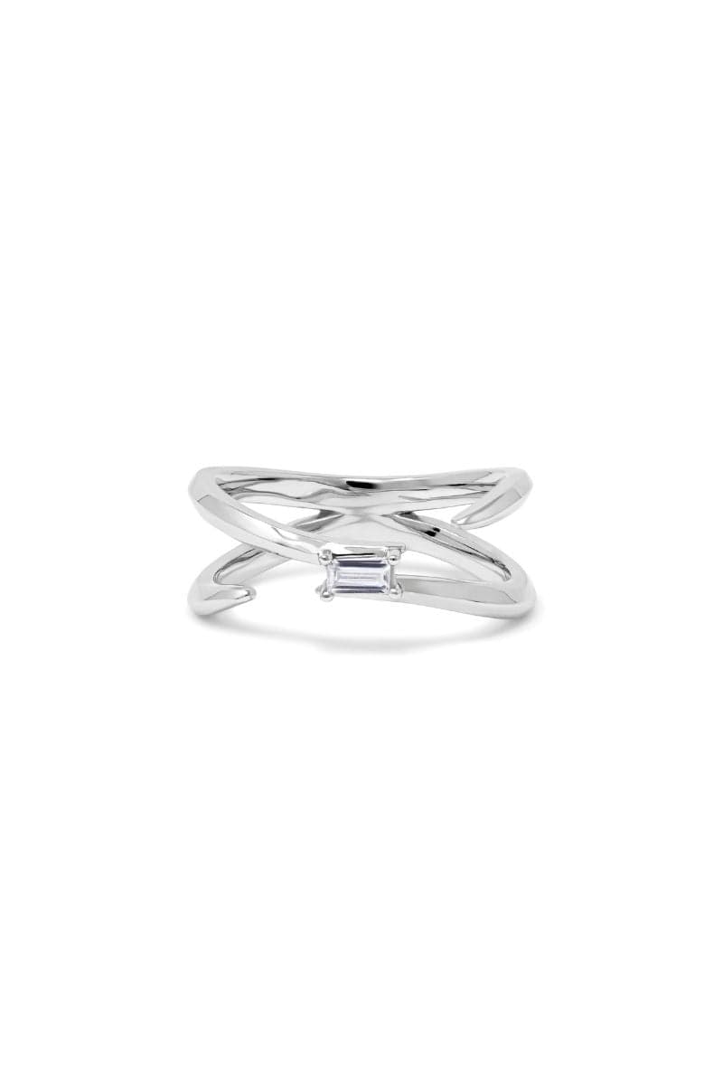EDXÚ Dew Rhodium Ring featuring a sleek, polished silver design with a smooth band and subtle shine.