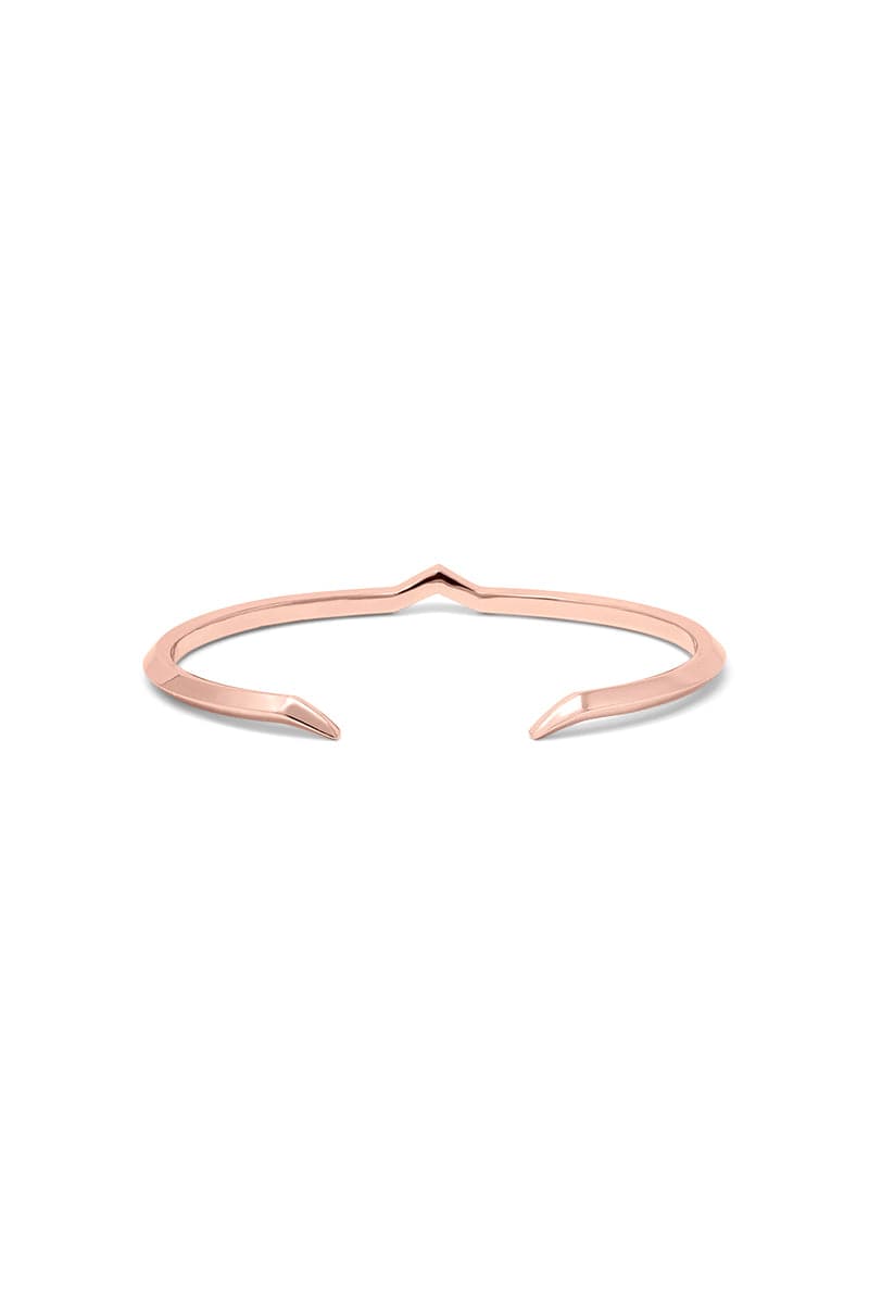Rose gold Fang Bangle bracelet by EDXÚ featuring a sleek, modern design with a bold fang motif.