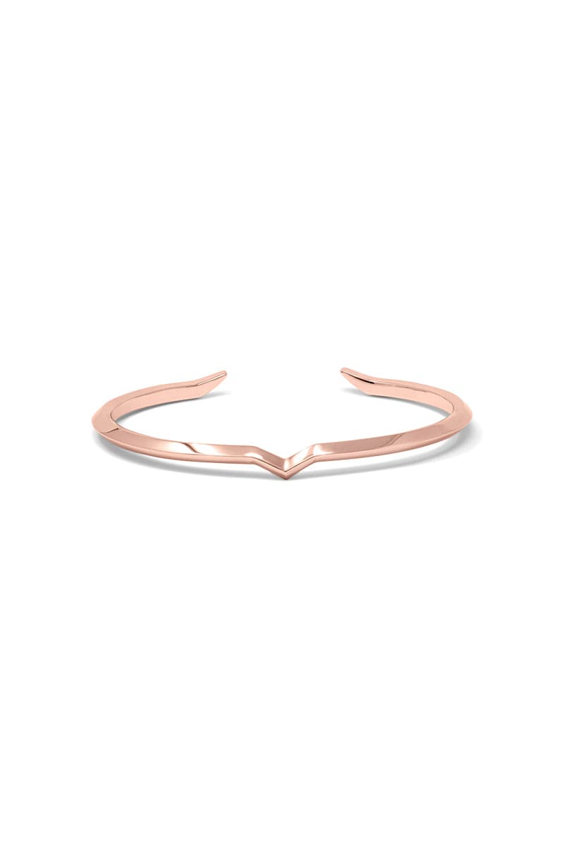 Rose gold Fang Bangle bracelet by EDXÚ with sleek, modern design and smooth finish, perfect for stylish wristwear.