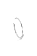 Rose gold EDXÚ FANG BANGLE bracelet with a sleek, modern design, featuring a smooth, polished surface and subtle detailing.
