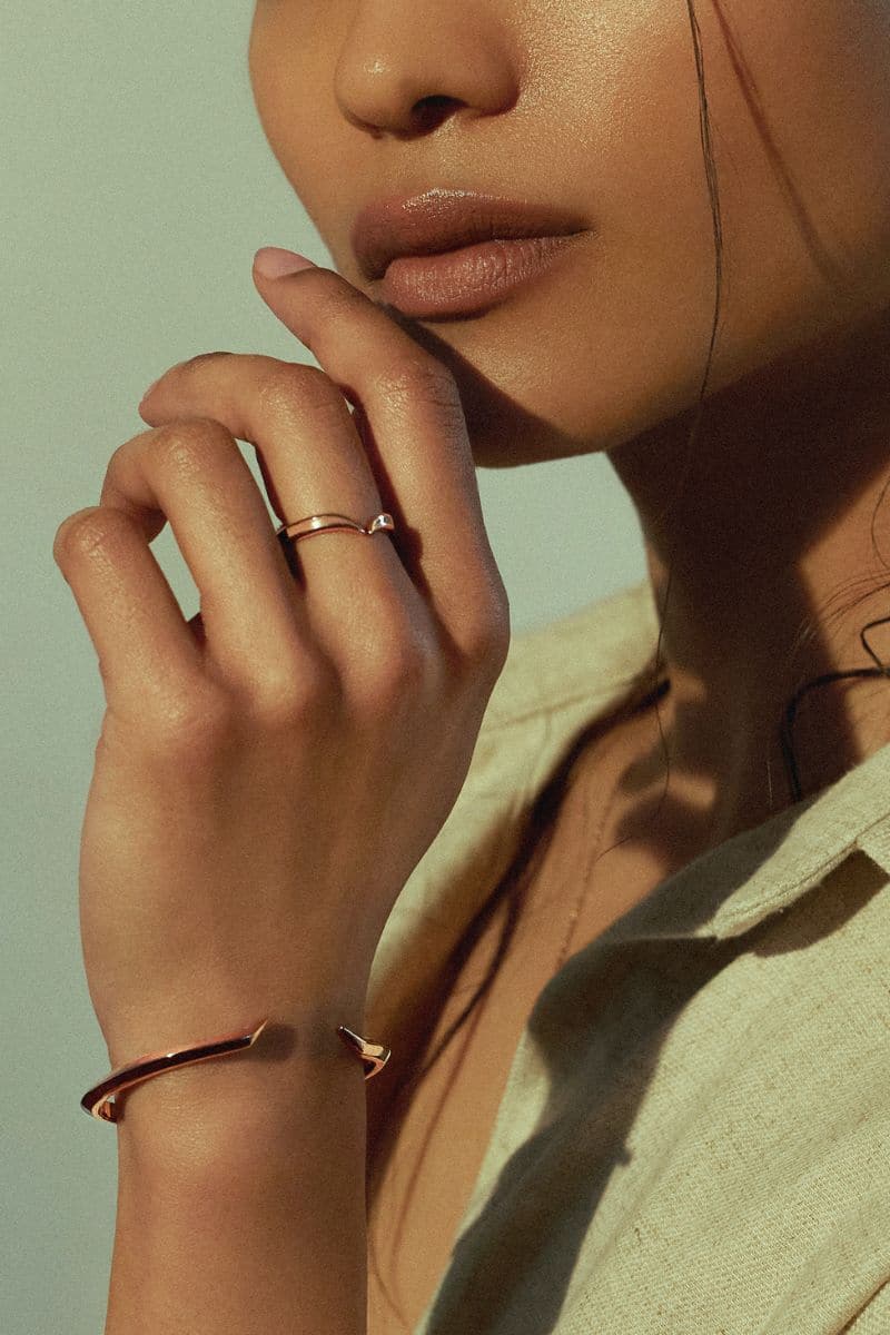 Rose gold Fang Bangle bracelet by EDXÚ with sleek, modern design and smooth finish.