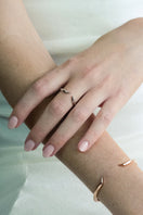 Yellow vermeil Fang Ring by EDXÚ, featuring a bold, sculpted design, displayed on a neutral background.