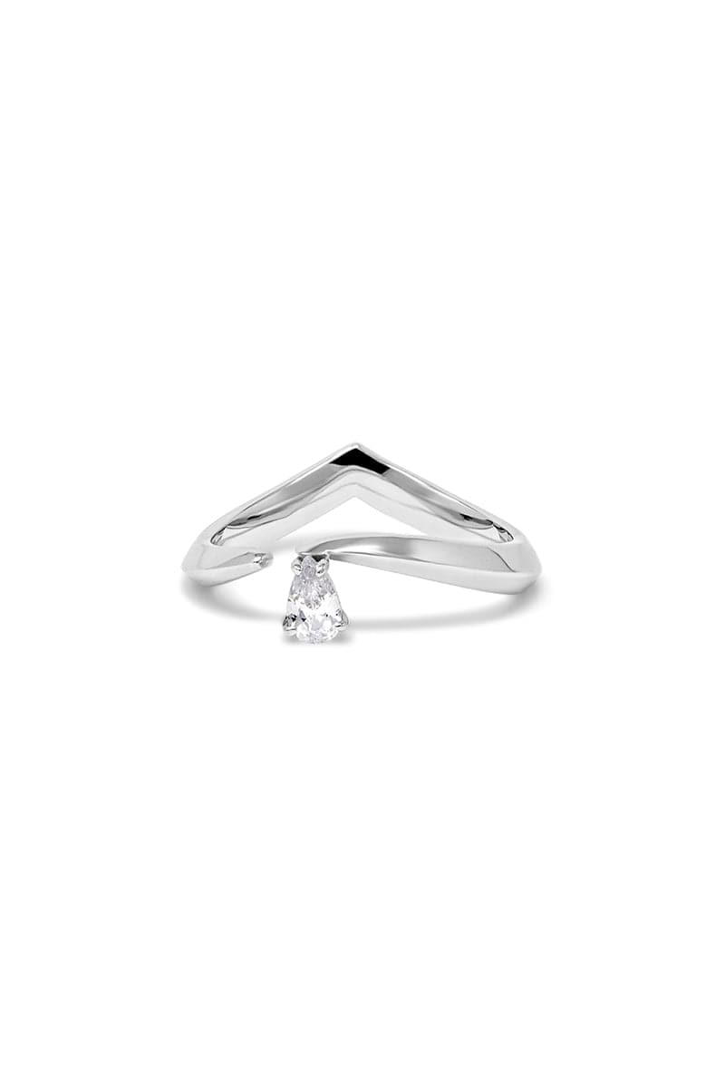 Silver tear drop ring by EDXÚ featuring a sleek, polished design with rhodium finish, perfect as elegant jewelry.