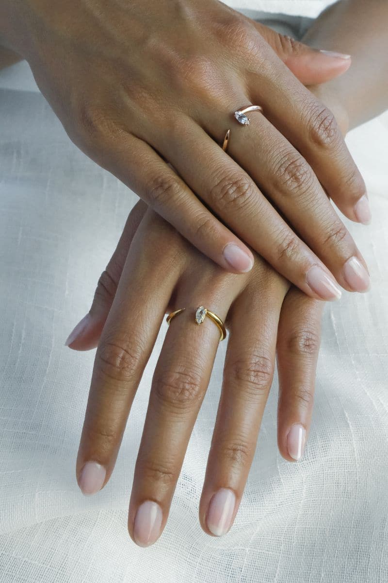 Silver tears drop ring by EDXÚ with a sleek, polished design and rhodium finish, perfect for elegant jewelry style.