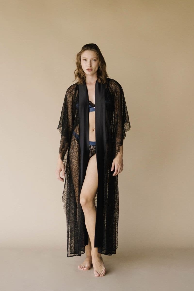 Black Kiharu satin robe from Entos, long satin pajamas with a smooth, luxurious fabric and relaxed fit, shown in black.