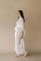White Kiharu long satin robe pajamas by Entos, soft satin fabric with a relaxed fit and elegant design, shown in white.