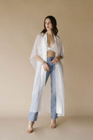 White Kiharu long satin robe pajamas by Entos, featuring smooth satin fabric and a comfortable, elegant fit.