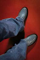 Sky blue Cult Mia X Gvasalia loafers with croc-effect leather design, stylish flats for casual or dressy wear.