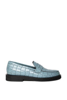 Sky-blue CULT MIA X GVASALIA croc-effect leather loafers, flat shoes with textured finish, stylish and comfortable for everyday wear.