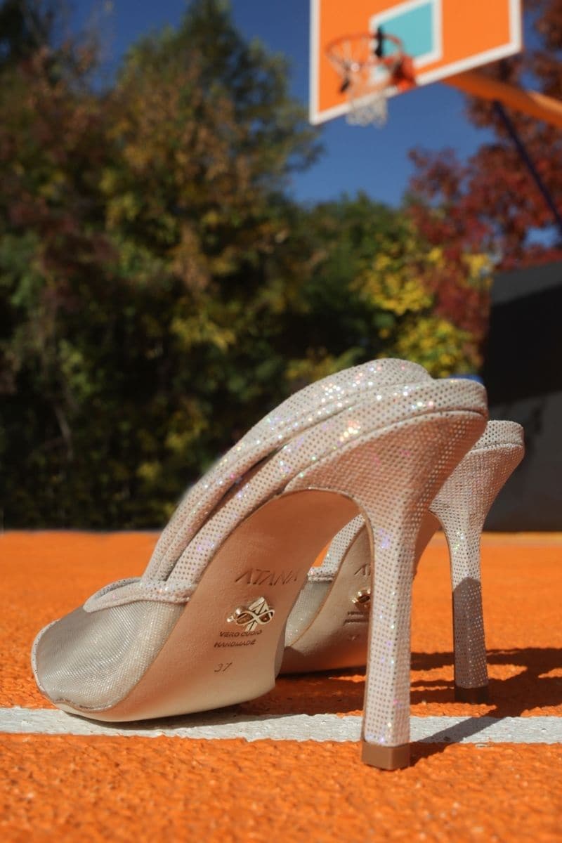 Silver hologram suede sling heels from House of Atana with mesh detail, stylish and modern footwear for special occasions.