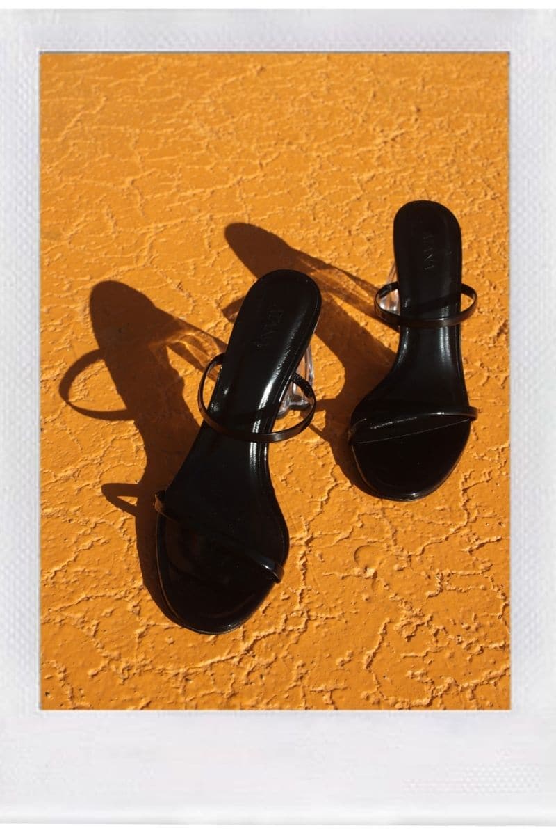Black patent block heel sandals by House of Atana with clear glass accents and adjustable straps.