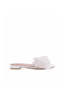 White patent bow slippers by House of Atana, stylish flat sandals with a bow detail, perfect for casual or dressy summer wear.