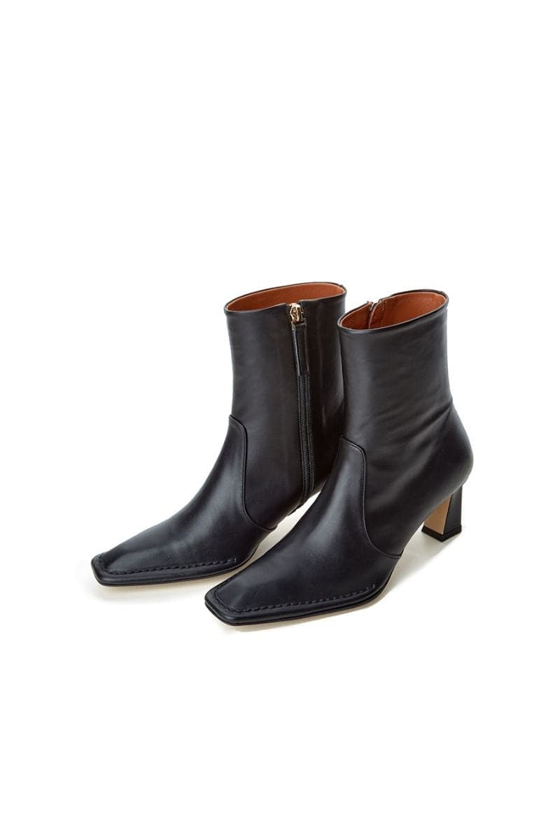 Je La Connais Calais black ankle boots for women, stylish footwear with a sleek design, size EU 35.