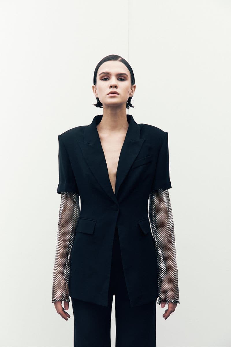 Joanna Andraos black blazer with tailored fit and classic lapel, stylish for formal or casual occasions.