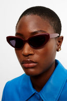 Kimeze Ruby Red Zawe Cat Eye Sunglasses with bold red frames and stylish cat eye shape, fashionable eyewear for women.