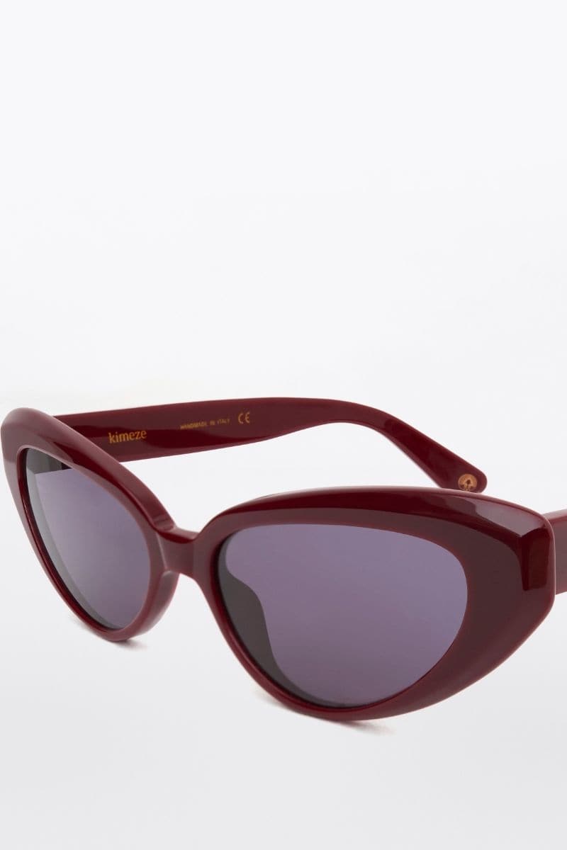 Kimeze Ruby Red Zawe Cat Eye Sunglasses with bold red frames and stylish cat eye shape.