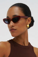 Kimeze Ruby Red Zawe Cat Eye Sunglasses with bold red frames and stylish design, perfect for fashionable summer accessories.