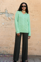 La Granni knitted mint green jumper with cable-knit design, long sleeves, and ribbed cuffs, XS size.