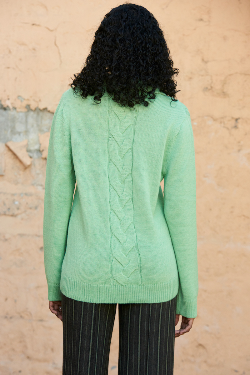 La Granni knitted mint green jumper sweater with cable-knit pattern, shown in size XS.