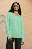 La Granni knitted mint jumper sweater with cables, featuring a cozy design and ribbed cuffs, shown in green.
